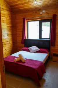 Giường trong phòng chung tại Moonking Chalet