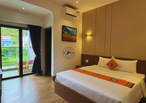 Postel nebo postele na pokoji v ubytování Ha Giang Hostel + 40 fotografií