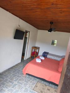 Et tv og/eller underholdning på Pousada e Restaurante Além das Nuvens