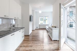 Køkken eller tekøkken på Club Alpenresidenz Gastein + 25 billeder