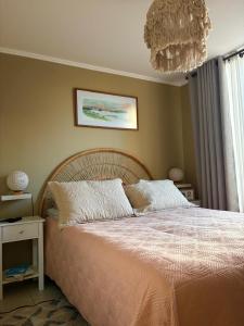 Postel nebo postele na pokoji v ubytování Departamento Costanera del Mar