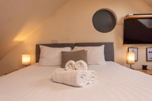 Postel nebo postele na pokoji v ubytování Silverwood Beautiful Loft in Telford - Pass the Keys + 8 fotografií