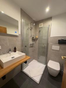 Koupelna v ubytování Berghotel Hohegeiß + 61 fotografií