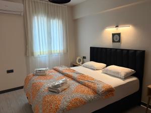 Cama ou camas em um quarto em Deka Evleri