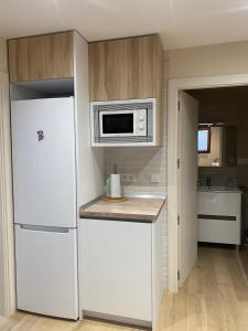 Kuchyň nebo kuchyňský kout v ubytování La Cuesta Verde. Mini hogar