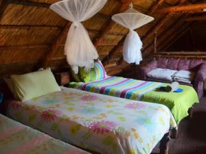 - 2 lits dans une chambre mansardée dans l'établissement Eingedi Retreat, à Kommissiepoort 169 autres photos