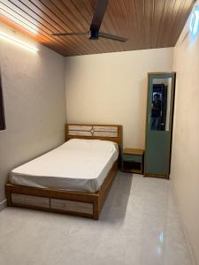 En eller flere senge i et værelse på HG Tower 2