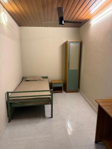 En eller flere senge i et værelse på HG Tower 2