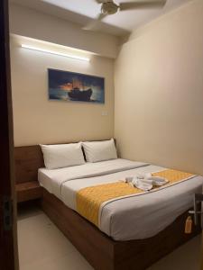 En eller flere senge i et værelse på HG Tower 2