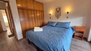 Postel nebo postele na pokoji v ubytování Oceana Suites Villarica