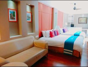 Postel nebo postele na pokoji v ubytování Wonderland Private Pool Villas at Port Dickson