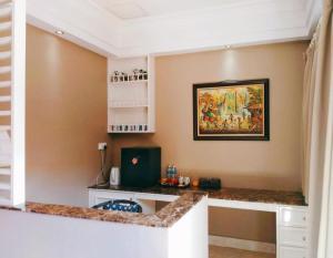 Kuchyň nebo kuchyňský kout v ubytování Wonderland Private Pool Villas at Port Dickson + 18 fotografií