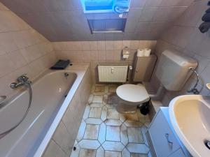 Et badeværelse på Ferienwohnung für Handwerker