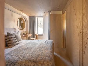 Giường trong phòng chung tại Chalet Acorn