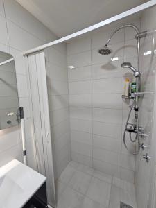 Koupelna v ubytování Ninche's Penthouse + 6 fotografií