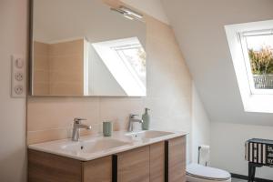 Et badeværelse på Gîte de charme à la ferme - Duplex