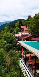 a resort with a view of a mountain at İsgobya Dağ Evleri 101 in Macka