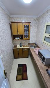 Photo de la galerie de l'établissement Skyline luxury hotel apartments 5 mins from Cairo Airport, au Caire