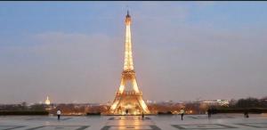 a view of the eiffel tower at night at Trocadero in Paris