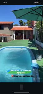 a video of a car parked in front of a house at Recanto do alberto in Camacari