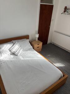 En eller flere senge i et værelse på Hockham