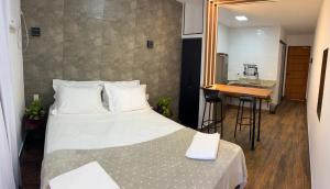 En eller flere senge i et værelse på Pousada Verde Serrath