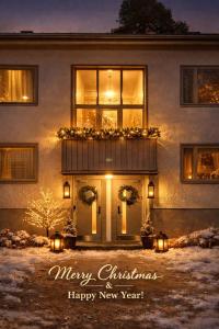 a house with a christmasreath on the front of it at Katariina Apartments in Kotka