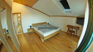 En eller flere senge i et værelse på Chalets Frauenalpe