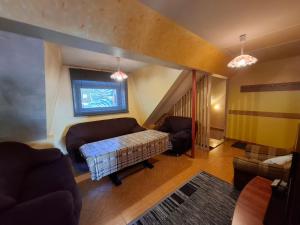 an overhead view of a living room with a couch at Atticapartament in Kluszkowce