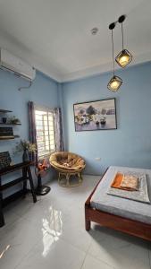 En eller flere senge i et værelse på Alleyhomestay- Trần Đại Nghĩa