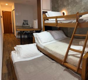 En eller flere senge i et værelse på Pousada Verde Serrath