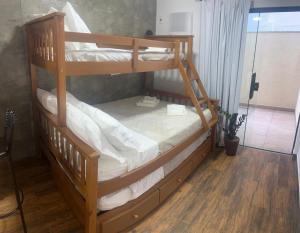 En eller flere senge i et værelse på Pousada Verde Serrath