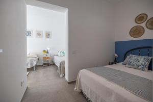 Postel nebo postele na pokoji v ubytování Appartamento Garden