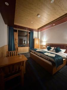 Postel nebo postele na pokoji v ubytování Himaja Retreat