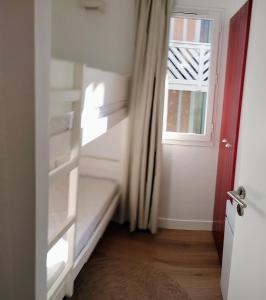 En eller flere senge i et værelse på La bulle de Lily