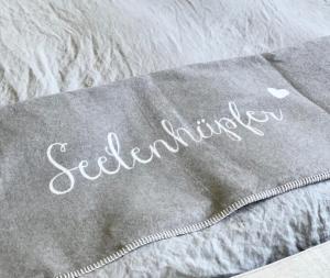 Postel nebo postele na pokoji v ubytování Kleine Hafenperle