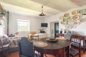 Khu vực ghế ngồi tại Qta Casa Seleiras - Guest House