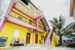 Photo de la galerie de l'établissement Travellers Palm Backpackers, à Caye Caulker