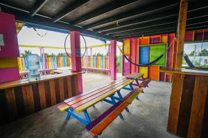 Photo de la galerie de l'établissement Travellers Palm Backpackers, à Caye Caulker