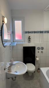 Et badeværelse på Gemütliche, lichtdurchflutete Wohnung