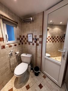 Phòng tắm tại Typique cabanon familial