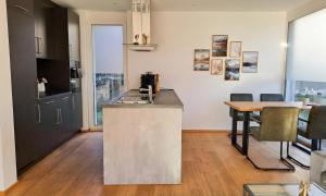 Kuchyň nebo kuchyňský kout v ubytování TBN Apparts Fritzens + 10 fotografií