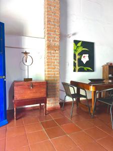 Et tv og/eller underholdning på Apartamento Colonial Puerta Azul