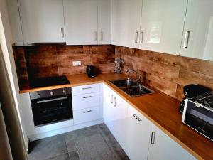 Køkken eller tekøkken på Andreas' Guest House