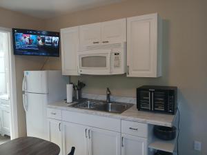 Kuchyň nebo kuchyňský kout v ubytování The Orchard Suite of Sebring