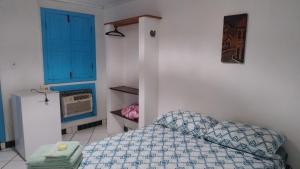 En eller flere senge i et værelse på Pousada Vista Bela