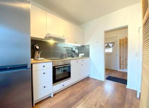 Kuchyň nebo kuchyňský kout v ubytování Kleine Hafenperle + 3 fotografie