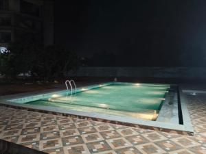 Swimmingpoolen hos eller tæt på La Nature Retreat + 9 billeder