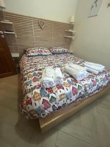 Postel nebo postele na pokoji v ubytování Chalet Natura