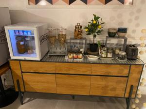 Køkken eller tekøkken på Aux Vendanges de Bourgogne